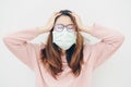 Portrait of sickness Asian woman wearing a mask to protect against infectious diseases from virus or bad pollution from PM2.5 smog Royalty Free Stock Photo