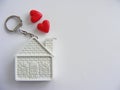 Conceptual house and red hearts isolated with place for writing Royalty Free Stock Photo