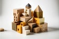 Conceptual image of building a house made of wooden blocks. Royalty Free Stock Photo