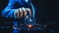 Futuristic technology sphere with glowing circuit board held by a businessman represents innovation Royalty Free Stock Photo
