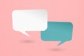 Conceptual image about communication and social media, two blank white and blue speech bubble paper cut on grunge pink paper Royalty Free Stock Photo