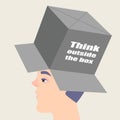 Conceptual image of a creative thinking. The guy with a box on his head.