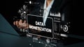 Conceptual Image of Data Monetization with Business Person Interacting with Digital Graphics on Computer Screen Royalty Free Stock Photo