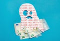 Conceptual image of Euribor as in scary monster floating above Euro money. Royalty Free Stock Photo