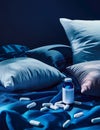 Sleep Aid Pills Bottle with Pillows Concept Royalty Free Stock Photo