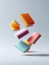Conceptual image of floating colorful books against a bright background. Represents learning, education, ideas, and imagination. Royalty Free Stock Photo