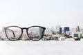 Conceptual image of glasses focusing on landscape, clarity in vision and perception Royalty Free Stock Photo