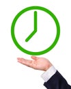 Conceptual image, green clock on hand.
