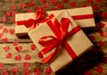 Conceptual image of Happy Saint valentines day wrapped gifts and red hearts on wooden vintage table