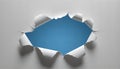 Hole in white paper with torn edges on a blue background Royalty Free Stock Photo