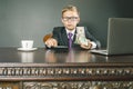 Conceptual image King of Banks. Successful banker holding money Royalty Free Stock Photo