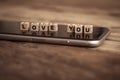 Conceptual image of mobile love text messaging for Valentines day and online connections technology
