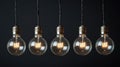 Conceptual Image of Perpetual Motion with Light Bulbs on Black Background Royalty Free Stock Photo