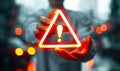 Conceptual image of a person holding a floating exclamation mark in a warning triangle, symbolizing caution, alertness, and