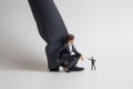 Depicting corporate hierarchy and imbalance, a macro shot with miniature figures Royalty Free Stock Photo