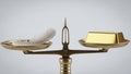 A classic brass scale balancing a light feather and a heavy gold bar. Royalty Free Stock Photo