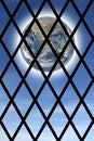 Conceptual image of the world seen through a prison bars - concept image