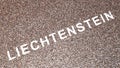 Conceptual large community of people forming the word LIECHTENSTEIN. 3d illustration metaphor for culture, history