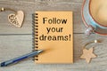 Conceptual manuscript showing Follow your dreams. Clarify your ideas and use your powers wisely