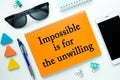 Conceptual manuscript showing Impossible is for the unwilling. Clarify your ideas and use your powers wisely