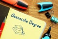 Conceptual photo about Associate Degree with handwritten phrase