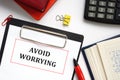 Conceptual photo about AVOID WORRYING with written phrase
