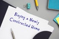 Conceptual photo about Buying a Newly Constructed Home with handwritten text Royalty Free Stock Photo
