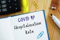 Conceptual photo about covid hospitalization rate with handwritten phrase