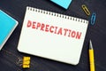 Conceptual photo about DEPRECIATION with handwritten phrase. An accounting method of allocating the cost of a tangible asset over