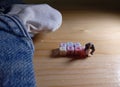 Conceptual Photo, Depression Sitting Man, near Blue Jeans Pocket