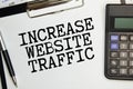 Conceptual photo about increase website traffic with handwritten text.