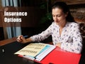 Conceptual photo about Insurance Options Businesswoman, executive manager hand filling paper business document