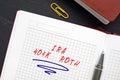 Conceptual photo about IRA 401K ROTH Individual Retirement Accounts with handwritten text. A type of retirement savings plan that Royalty Free Stock Photo