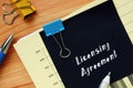 Conceptual photo about Licensing Agreement with handwritten text