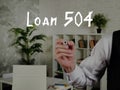Conceptual photo about Loan 504 with handwritten phrase