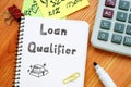 Conceptual photo about Loan Qualifier with written phrase Royalty Free Stock Photo