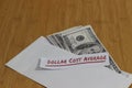 Conceptual Photo, money paper inside white Envelope and text Dollar Cost Average, or DCA golden rule investment