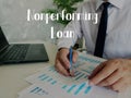 Conceptual photo about Nonperforming Loan with handwritten phrase Royalty Free Stock Photo