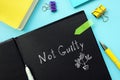 Conceptual photo about Not Guilty H with handwritten phrase