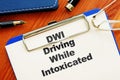 Conceptual photo showing printed text DWI driving while intoxicated