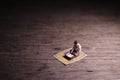 Conceptual Photo, Sitting Muslim, Islam People Reading Al Quran, at Wooden Floor Royalty Free Stock Photo