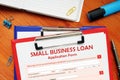 Conceptual photo about SMALL BUSINESS LOAN Application Form with written phrase financial document Royalty Free Stock Photo
