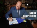 Conceptual photo about Speed Restrictions Businessman, executive manager hand filling paper business document