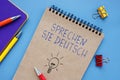 Conceptual photo about Sprechen Sie Deutsch with handwritten phrase Royalty Free Stock Photo