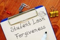 Conceptual photo about Student Loan Forgiveness Definition with handwritten text