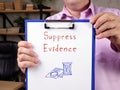 Conceptual photo about Suppress Evidence with handwritten text