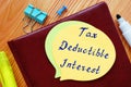 Conceptual photo about Tax Deductible Interest with handwritten text