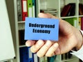Conceptual photo about Underground Economy with handwritten phrase