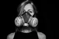 Conceptual photo woman eyes of young woman in respirator. Royalty Free Stock Photo