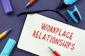 Conceptual photo about Workplace Relationships with handwritten text